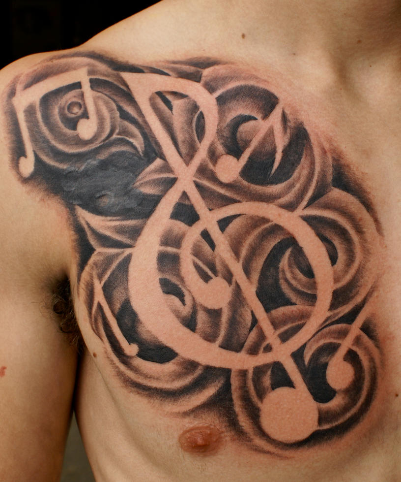 freehand music tattoo by