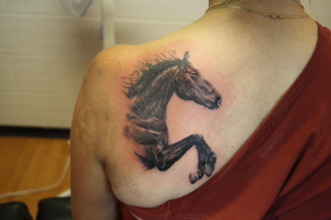 jumping horse tattoo by